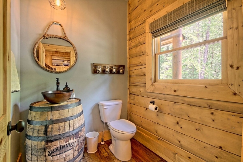 Repurposed Whiskey Barrel Bathroom Vanity with Rope Mirror