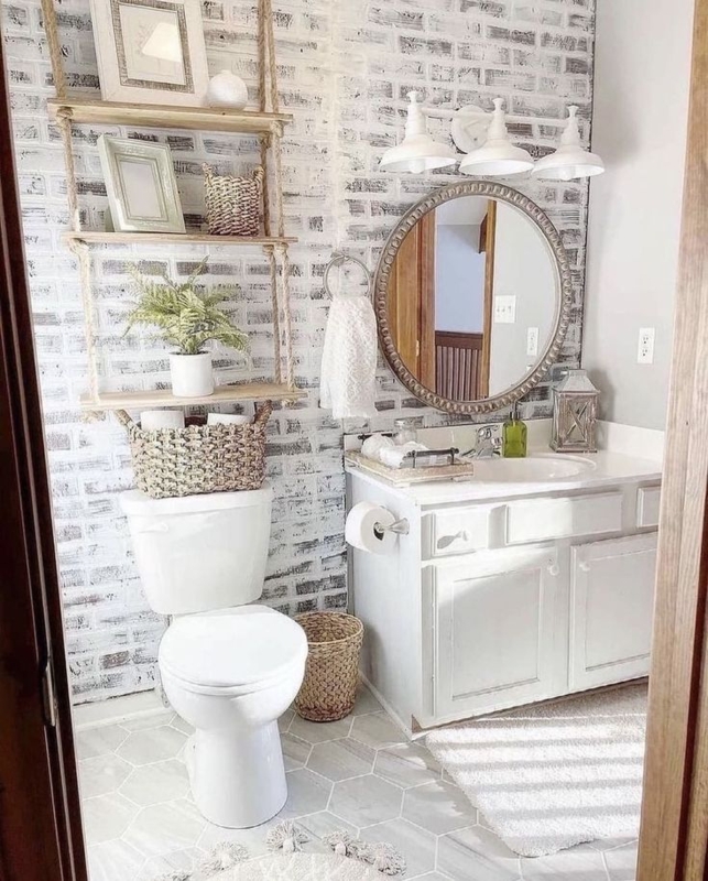 Rope Hanging Shelves Over Toilet against Whitewashed Brick Wall