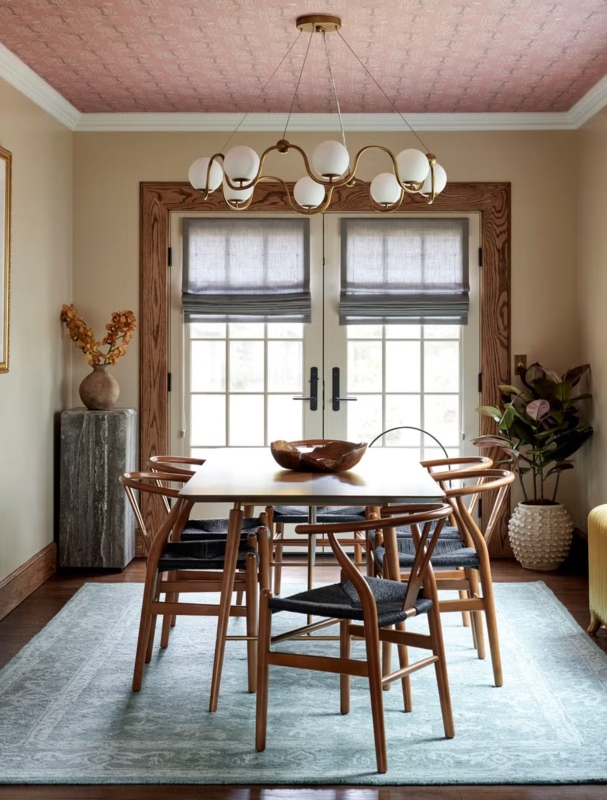 Rose Patterned Ceiling Dining Room Idea with Wishbone Chairs