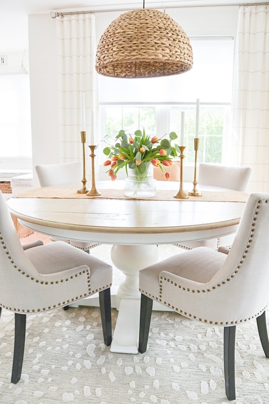 Round Pedestal Dining Table: Woven Dome Pendant & Nailhead Trim Chairs
