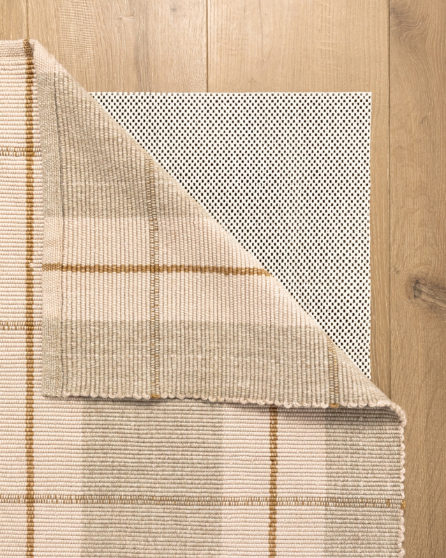 Rug Pad: Gray Perforated Surface, Breathable Outdoor Rug Pad for Decks