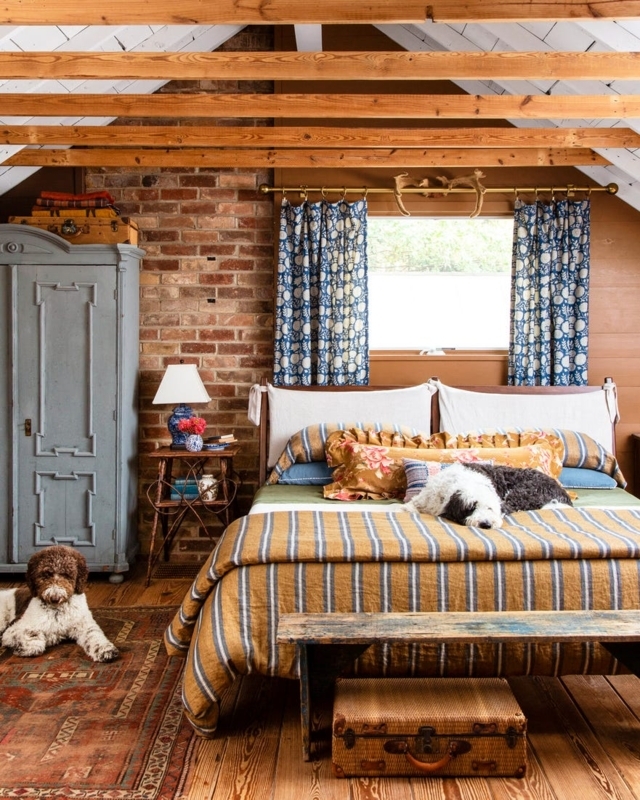 Rustic Attic Bedroom: Brick Accent Wall, Mustard Striped Bedding.