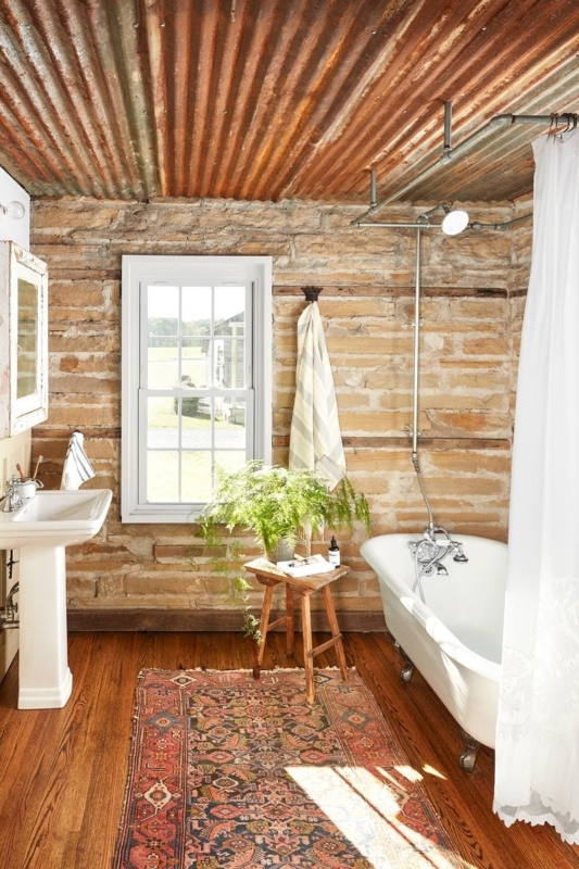 Rustic Bathroom: Clawfoot Tub & Corrugated Metal Ceiling