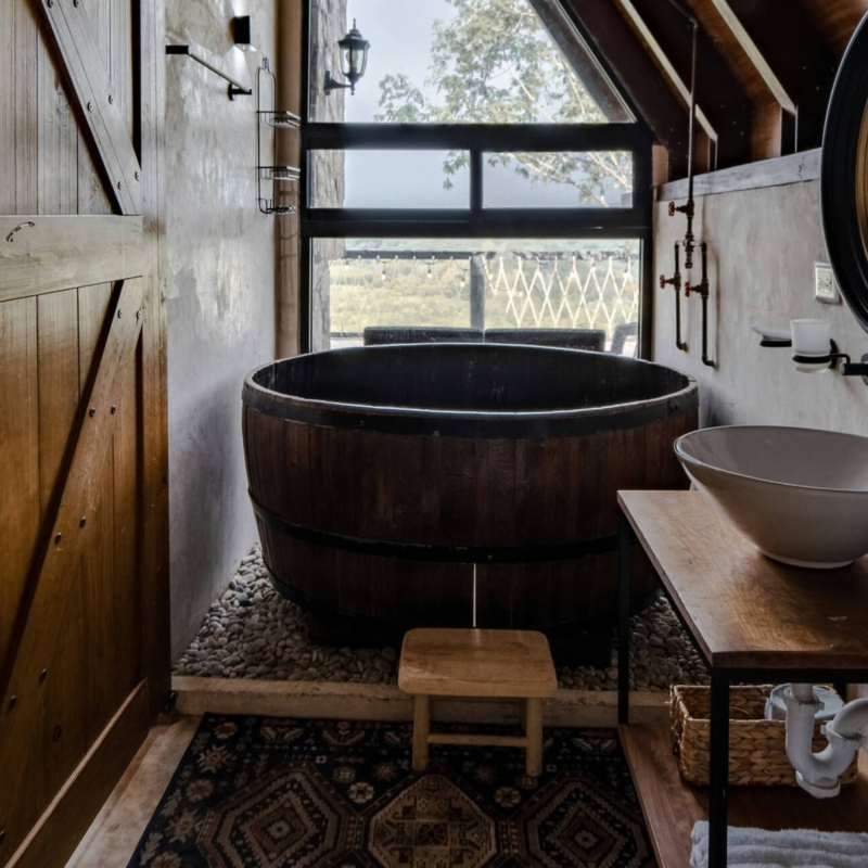 Rustic Bathroom: Wooden Barrel Tub & River Stone Bed
