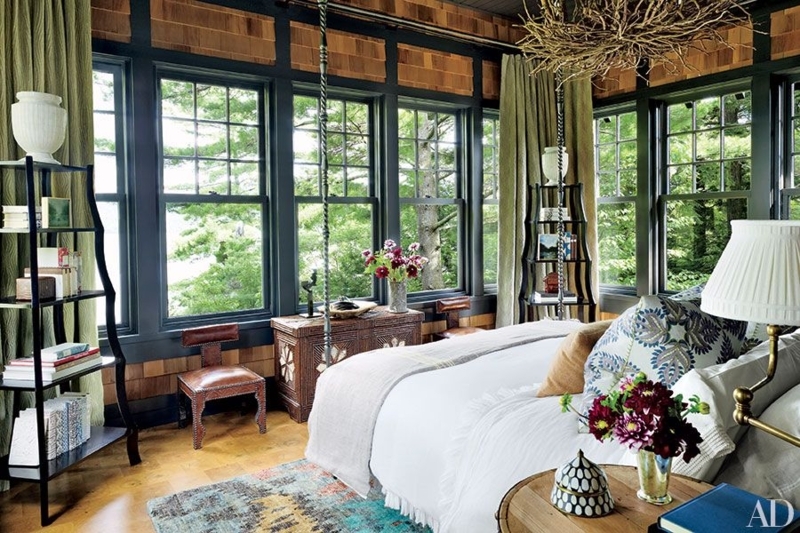 Rustic Bedroom With Forest View Windows And Wood Shingle Walls