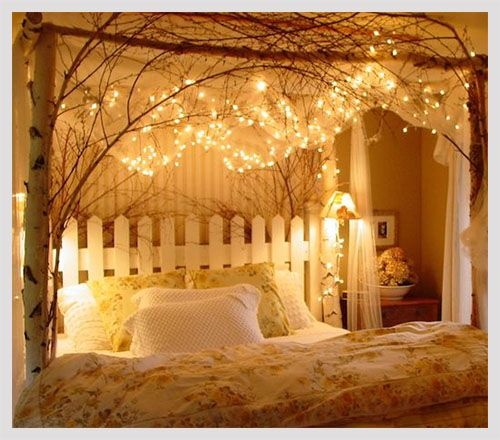 Rustic Canopy Bed with Natural Branch Canopy and Fairy Lights Decor