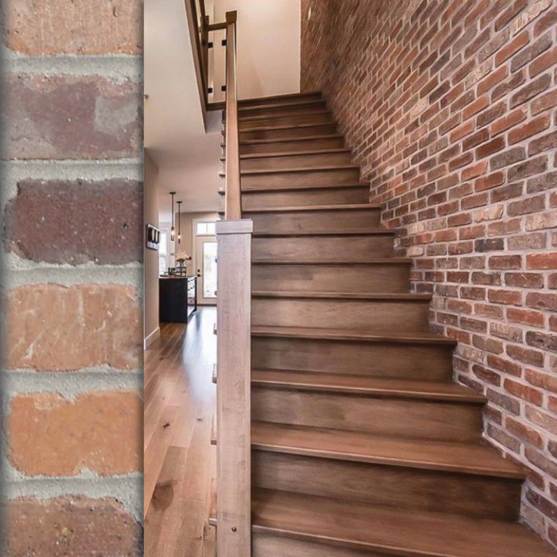 Rustic Industrial Staircase: Multi-Toned Brick Wall & Wood Treads