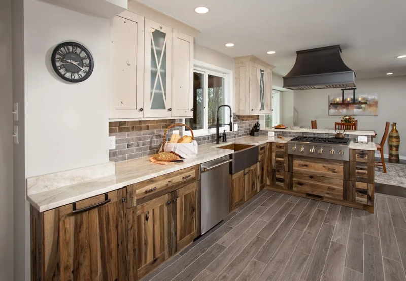 Rustic Kitchen with Wood Cabinets and Large Dark Range Hood