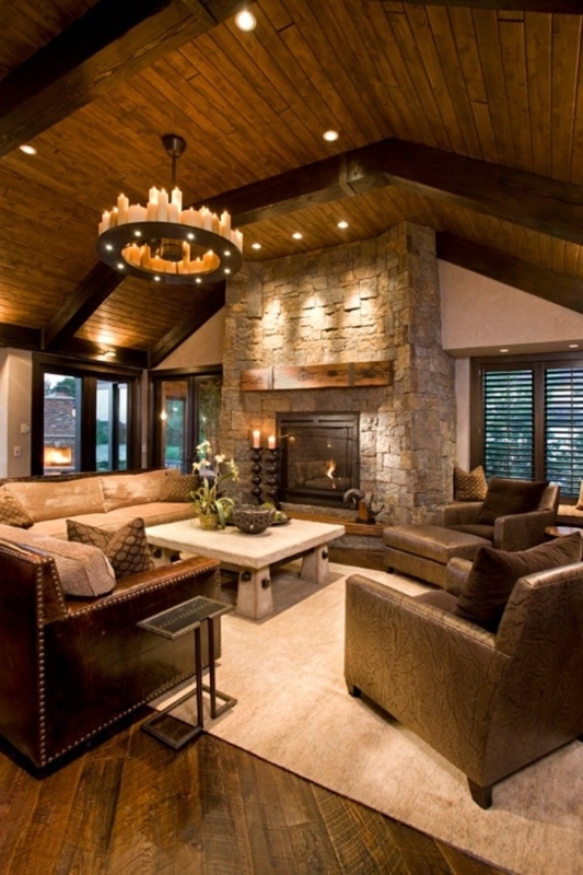 Rustic Living Room with Stacked Stone Fireplace and Ring Chandelier
