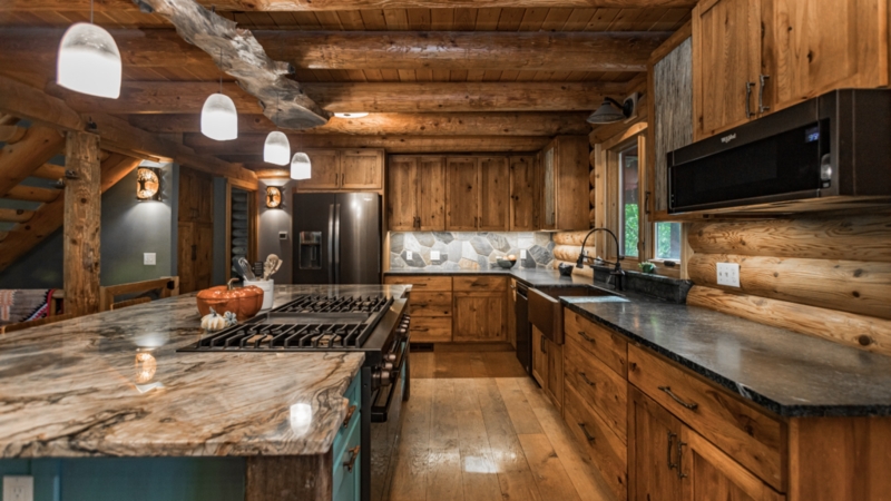 Rustic Log Cabin Kitchen Design with Marble Waterfall Island
