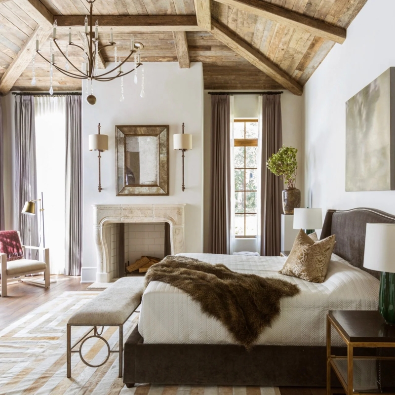 Rustic Master Bedroom Design with Vaulted Ceiling and Stone Fireplace