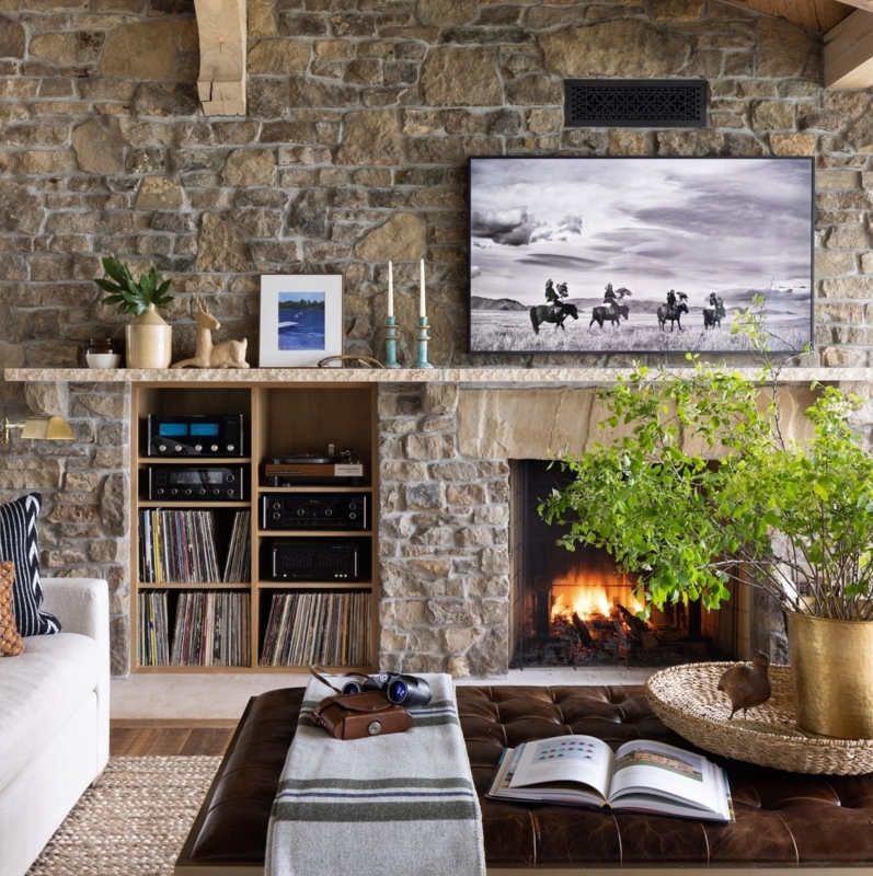 Rustic Stone Fireplace Wall with Integrated Record Storage