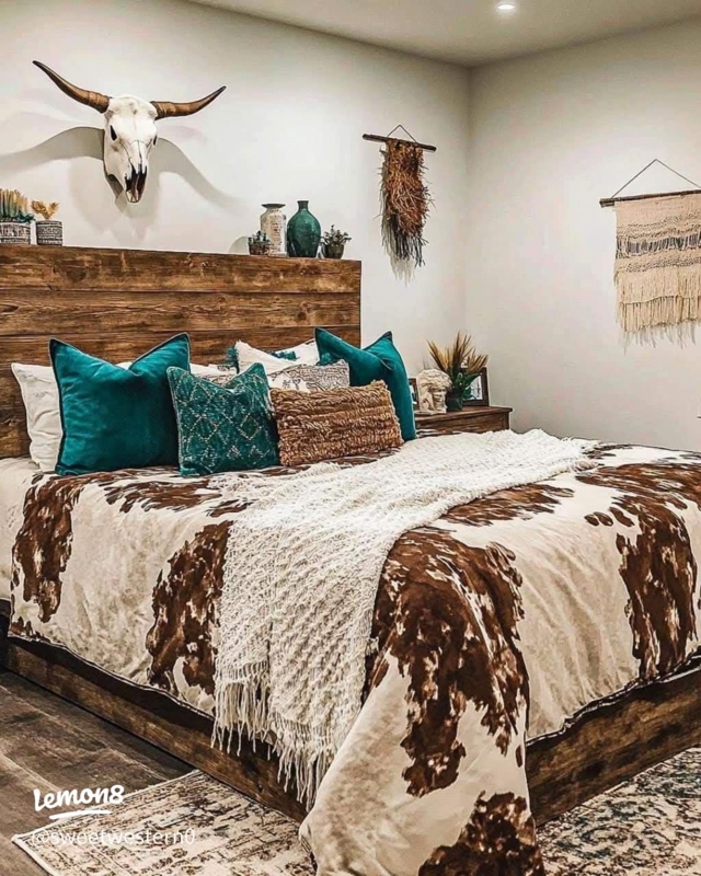 Rustic Western Bedding with Teal Accent Pillows and Cowhide Print