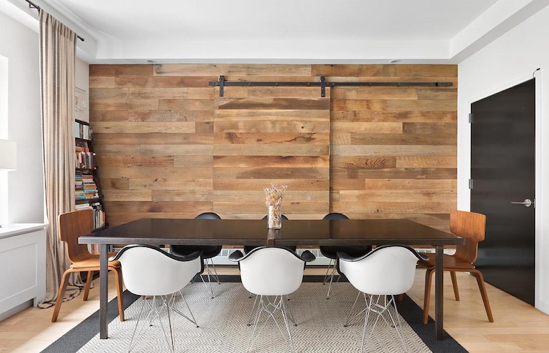 Rustic Wood Plank Accent Wall with Sliding Barn Door Hardware