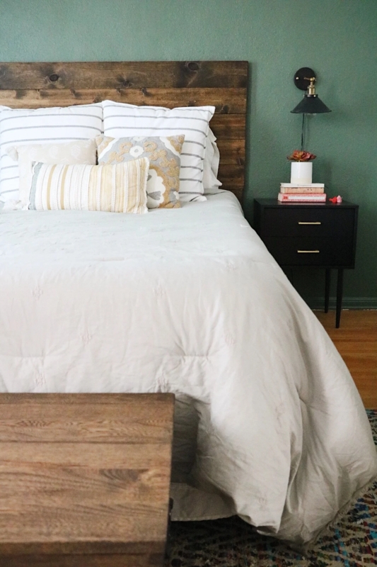 Rustic Wood Plank Headboard Bed in Dark Green Bedroom