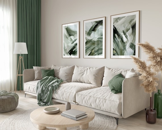 Sage Green Abstract Triptych Wall Art Set above Sectional Sofa