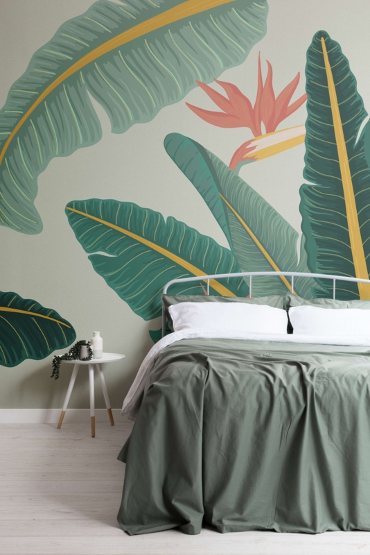 Sage Green Bedding and White Metal Frame in a Minimalist Tropical Room
