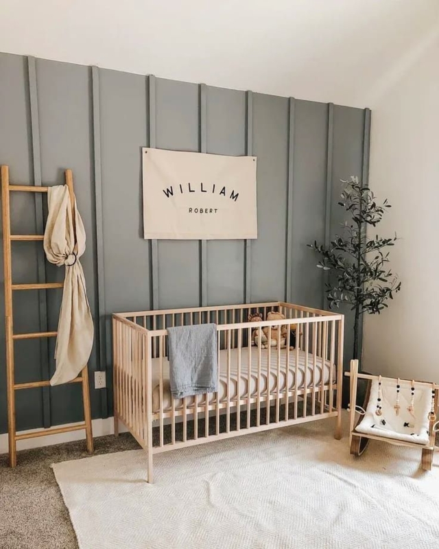 Sage Green Board & Batten Accent Wall with Natural Wood Spindle Crib