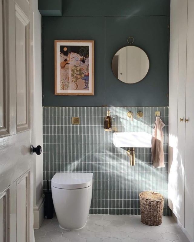 Sage Green Finger Tile Bathroom with Dark Teal Cabinetry and Brass