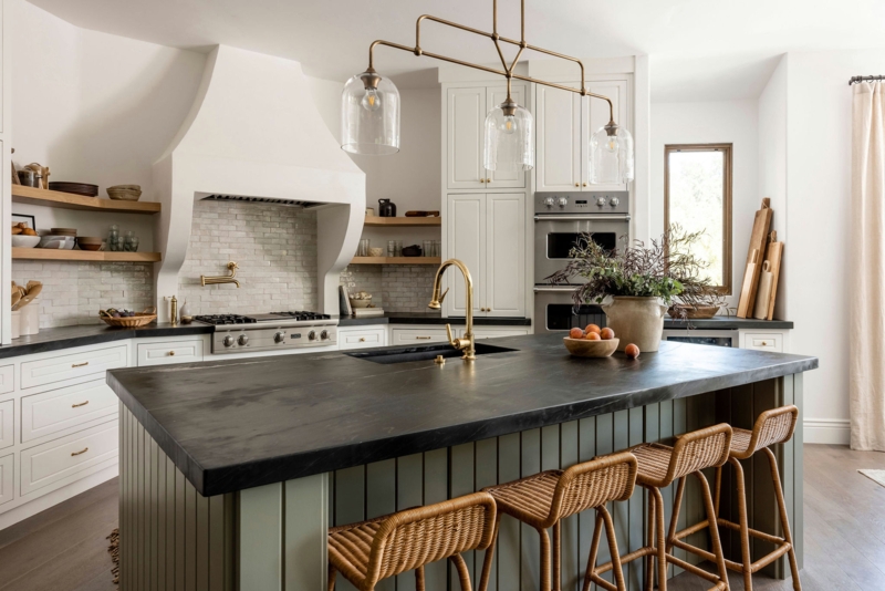 Sage Green Kitchen Island Base with Dark Stone Top and Rattan Stools