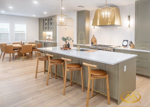 Sage Green Kitchen Island with Gold Lantern Pendants
