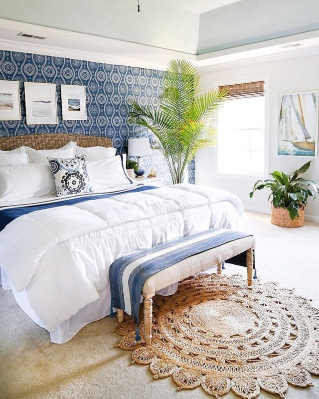 Scalloped Jute Rug and Geometric Wallpaper in a Coastal Breezy Bedroom
