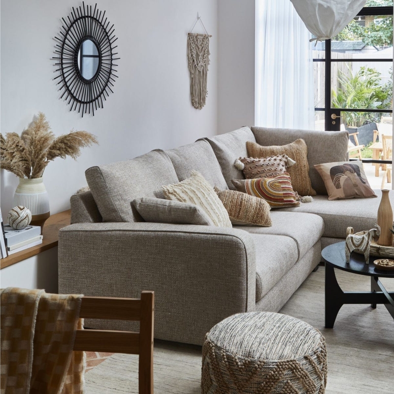 Scandi-Boho Living Room with L-Shaped Sectional and Macrame Wall Hanging