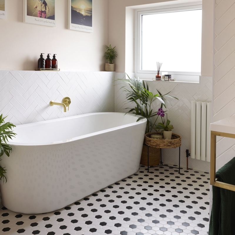 Scandinavian Bathroom: Herringbone Backsplash And Hex Tile Flooring