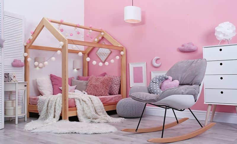 Scandinavian Bedroom with a House Bed Frame and a Gray Rocking Chair