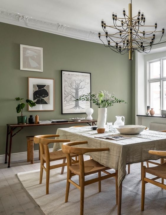 Scandinavian Dining Room with Wishbone Chairs and Gallery Wall