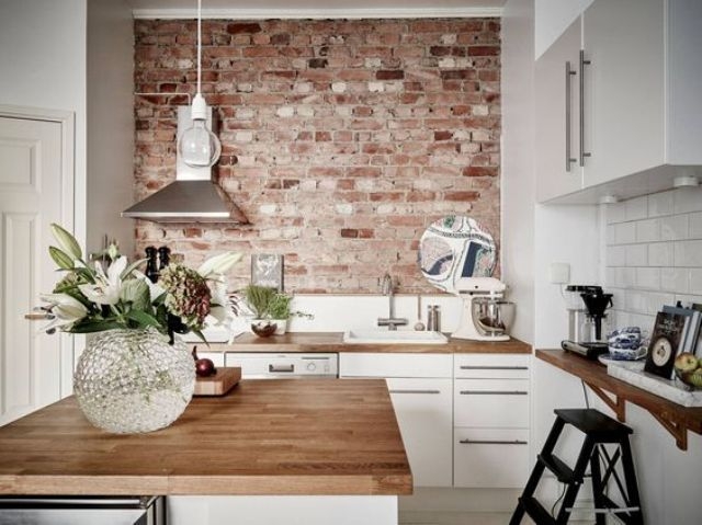 Scandinavian Kitchen: Exposed Red Brick Wall & Butcher Block Island