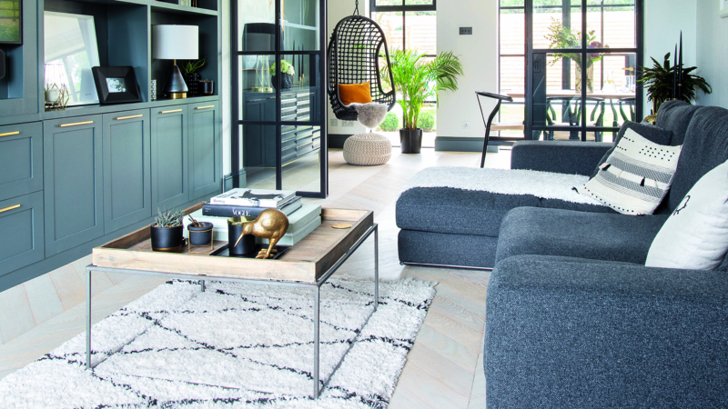 Scandinavian Living Room Blue Grey Built Ins Geometric Shag Rug Sectional