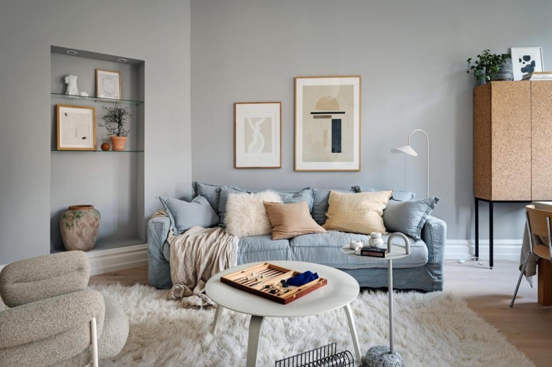 Scandinavian Minimalist Sofa with Cork Cabinet and Shaggy Rug
