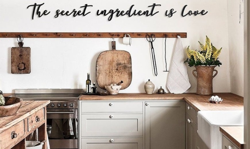 Script Wall Art Decal above Wooden Peg Rail in Rustic Farmhouse Kitchen