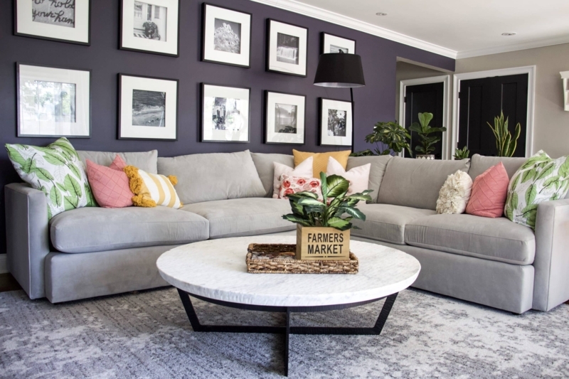 Sectional Sofa against Plum Accent Wall with Ten-Piece Gallery Wall