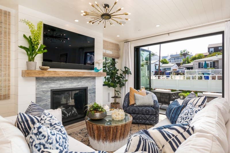 Sectional Sofa with Accordion Glass Wall for Indoor Outdoor Living Design
