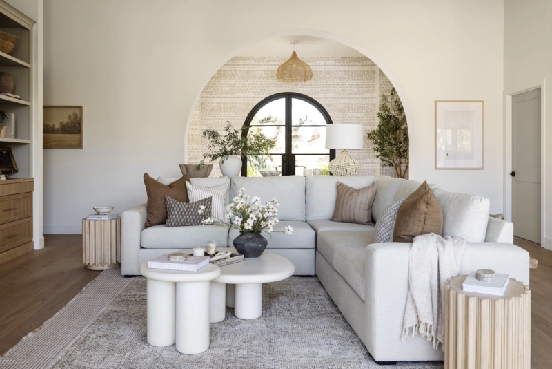 Sectional Sofa with Sculptural Nested Coffee Tables and Fluted Accents