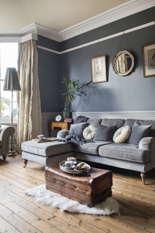 Sectional Sofa with Turned Legs and Antique Trunk Coffee Table