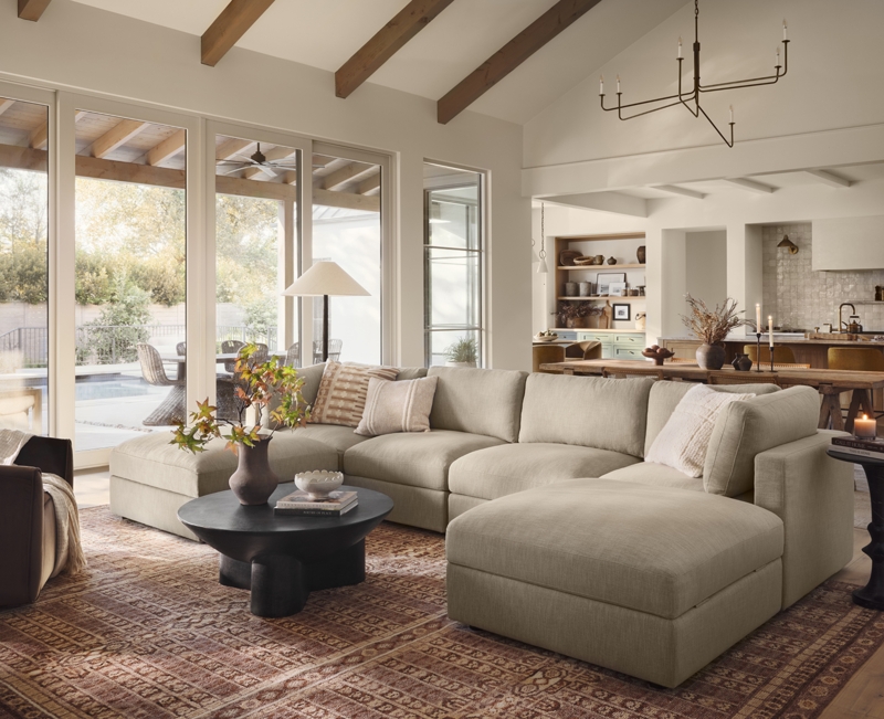 Sectional Sofa with Vaulted Wood Beams, Modular Design & Patterned Rug
