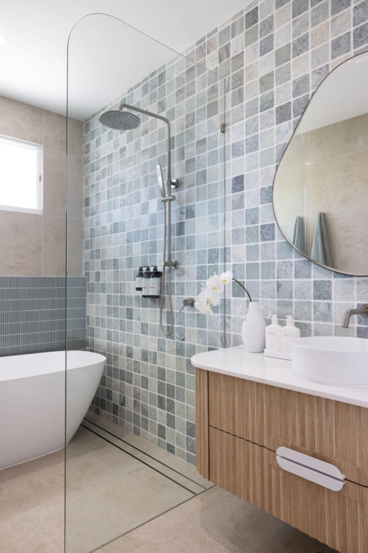 Serene Floating Ribbed Vanity with Sage Mosaic Tiles and Vessel Sink