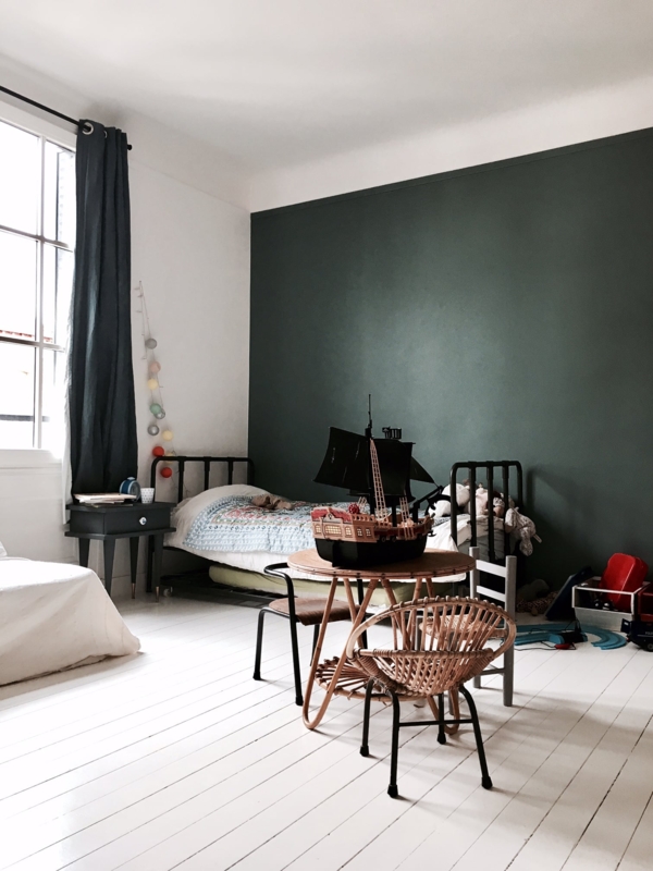Shared Kids Room featuring Black Metal Beds and White Painted Floors