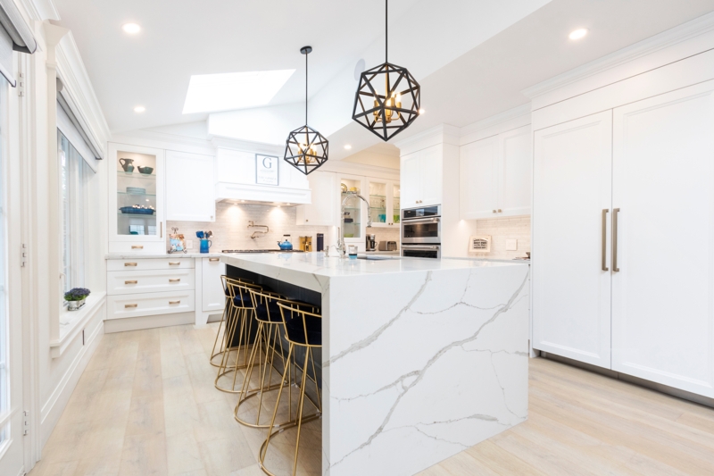 Skylight and Geometric Pendant Lighting in a Modern Kitchen