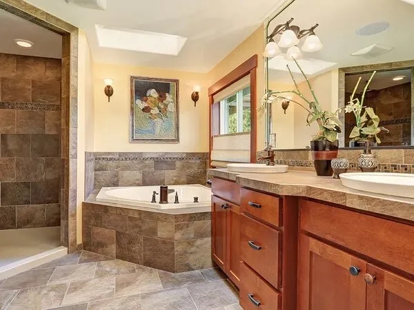 Skylight: Traditional Master Bath with Earthy Tile & Corner Tub