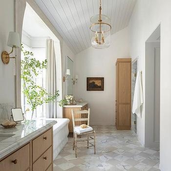 Sloped Wood Plank Ceiling and Harlequin Floor Tiles