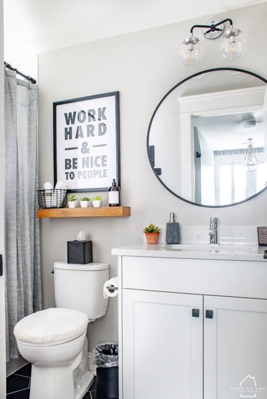 Small Bathroom Design: Black Hexagon Floor Tile and Round Mirror