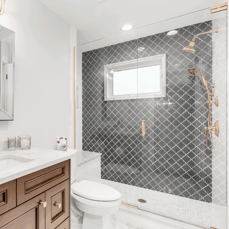 Small Bathroom Walk-In Shower: Grey Quatrefoil Tile & Gold Fixtures