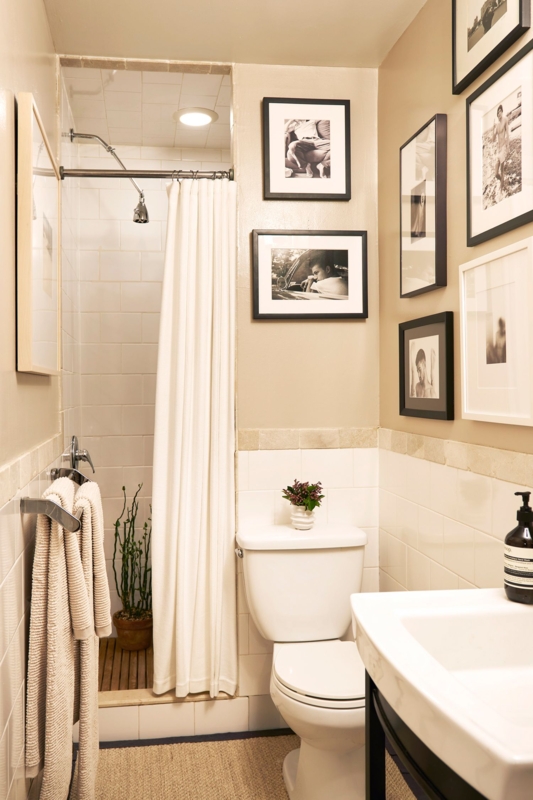 Small Bathroom with Gallery Wall and Subway Tile Wainscoting