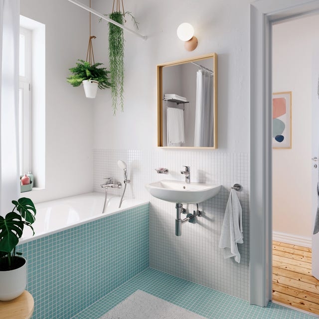 Small Bathroom with Teal Mosaic Tiles, Floating Sink & Hanging Plants