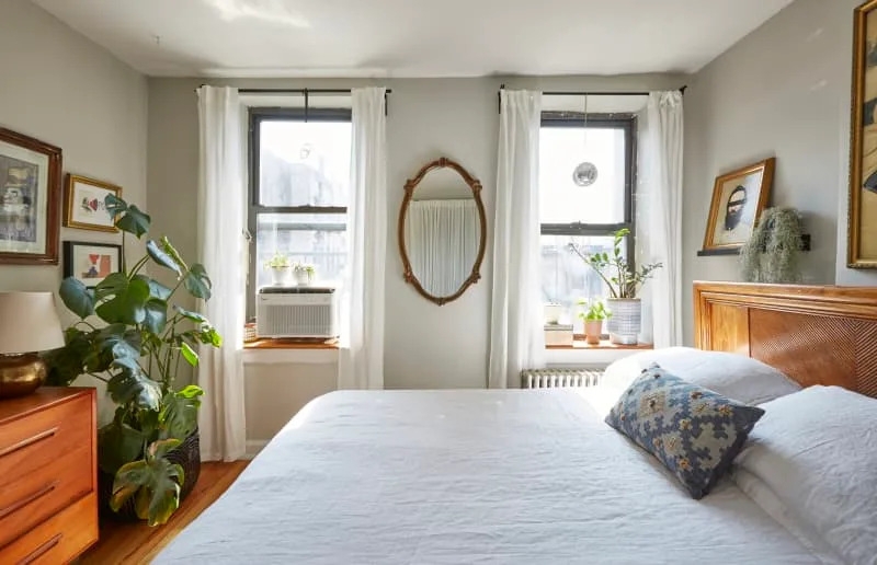 Small Bedroom Window Layout featuring Mirror Between Windows