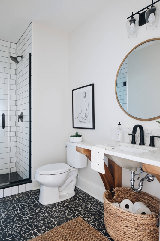 Small Farmhouse Bathroom Shower with Bold Patterned Floor Tile